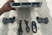 PS3 slim craquée avec 20 jeux et 2 manettes