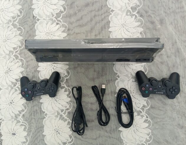 PS3 slim craquée avec 20 jeux et 2 manettes